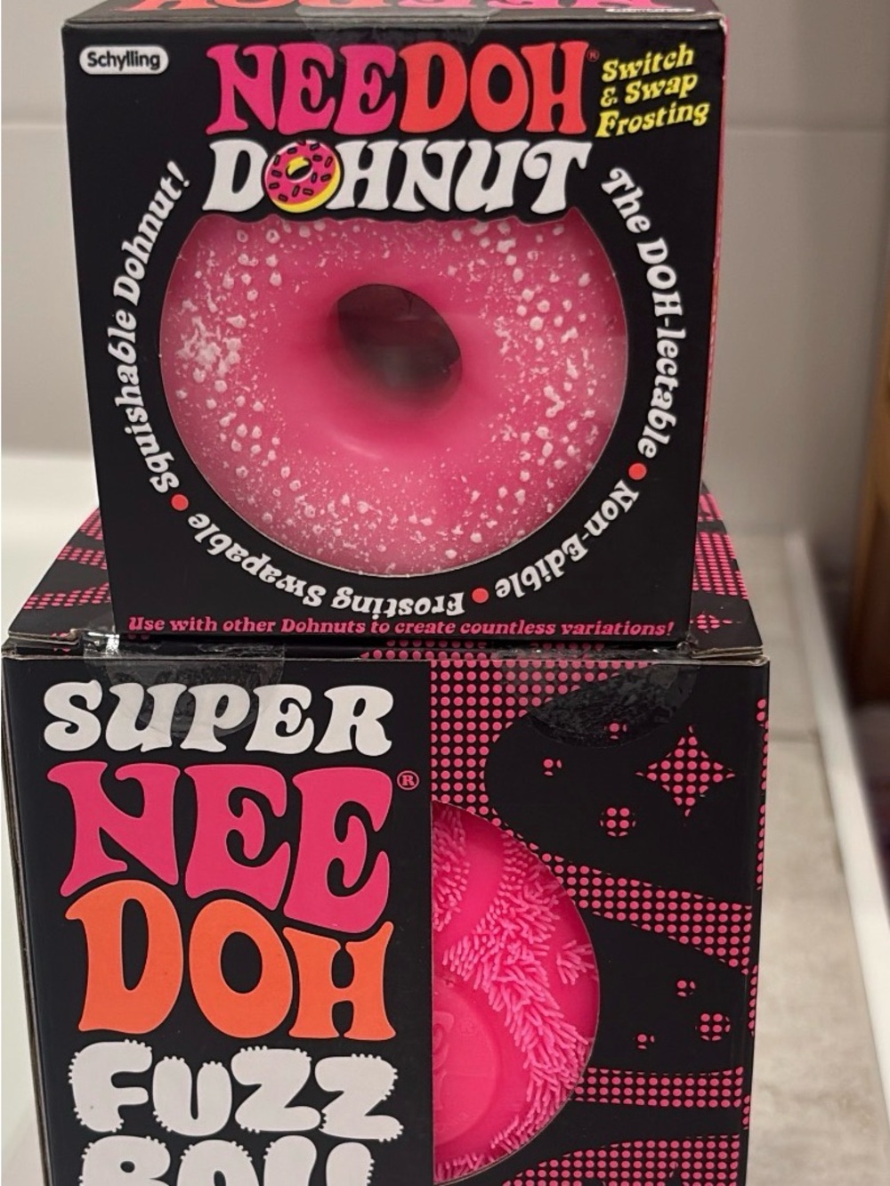 NeeDoh Donut Pink & Super NeeDoh Fuzz ball Pink,Looking for me cakes/ or 4 Sale